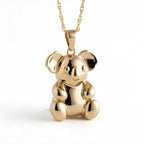 9ct Gold Koala pendant on a white background